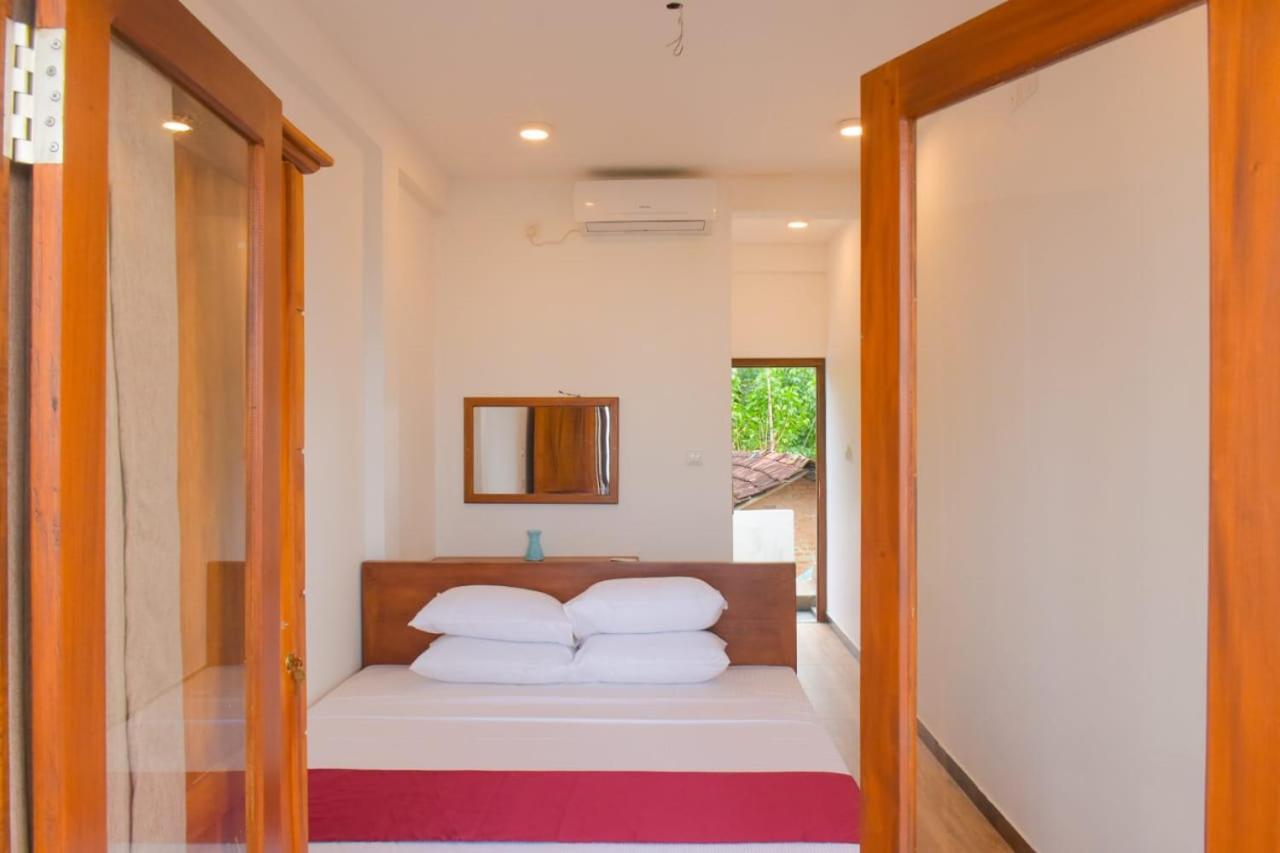 Ocean Breeze Villa Matara Quarto foto